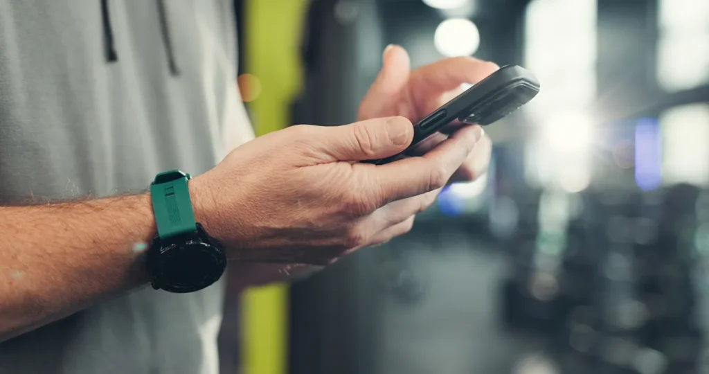 Person using a phone to manage a chronic condition